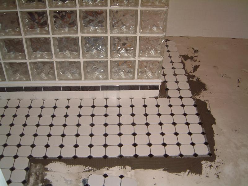 08Tiling the Floor.JPG